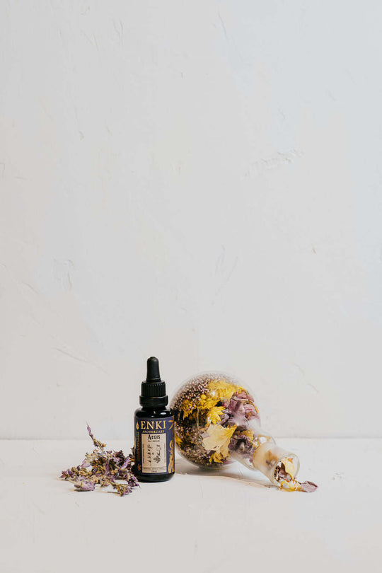 enki aegis serum in violet glass