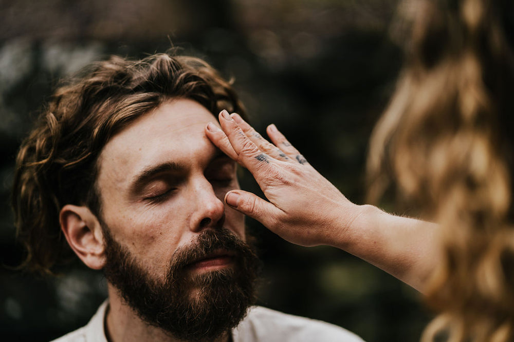 Beautiful man being anointed with oil