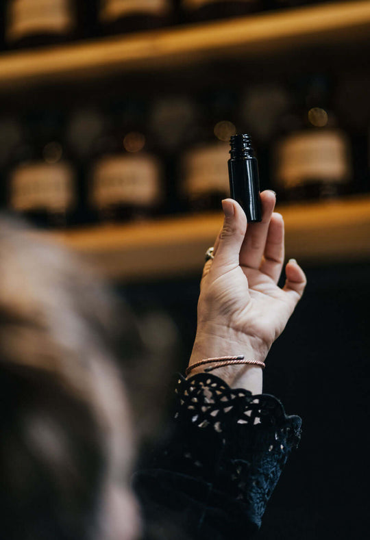 Small Miron Bottle held in the hand