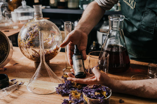 Blue Lotus Tincture with lab equipment